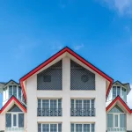 Beautiful home with a nice roof against a blue sky